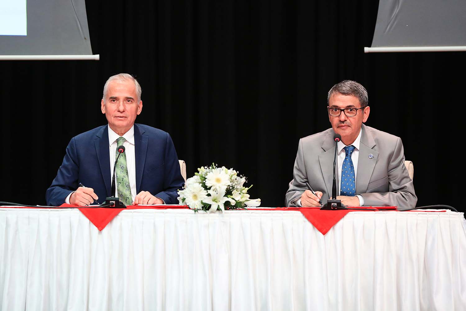 paü,rektör,ahmet, kutluhan,